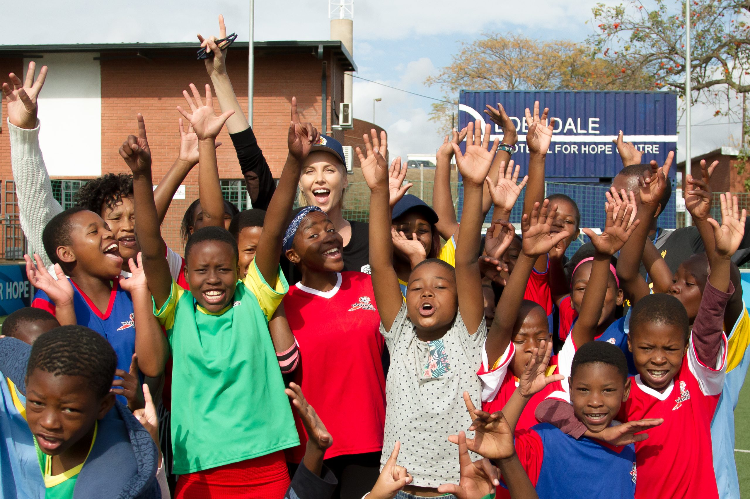 Charlize Theron Africa Outreach Project group photo