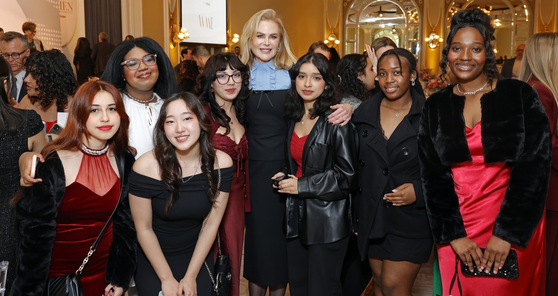 BEVERLY HILLS, CALIFORNIA - DECEMBER 04: Nicole Kidman (C) poses with THR's Women in Entertainment mentees during The Hollywood Reporter Women in Entertainment 2024 at The Beverly Hills Hotel on December 04, 2024 in Beverly Hills, California.